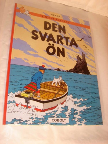 Tintins äventyr 07 - Den svarta ön INB. NY Cobolt