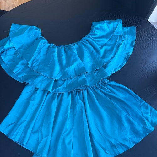 Turkosblå playsuit, storlek 38