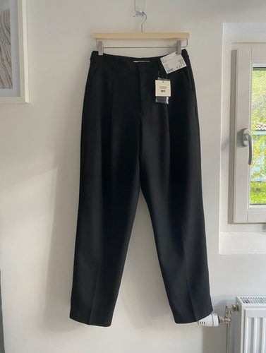 Uniqlo svarta byxor, storlek 27INCH / 68.5CM