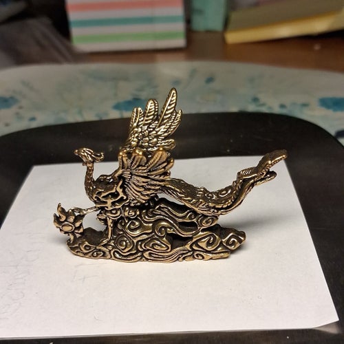 Fågelstatyett i mässing (fenix)