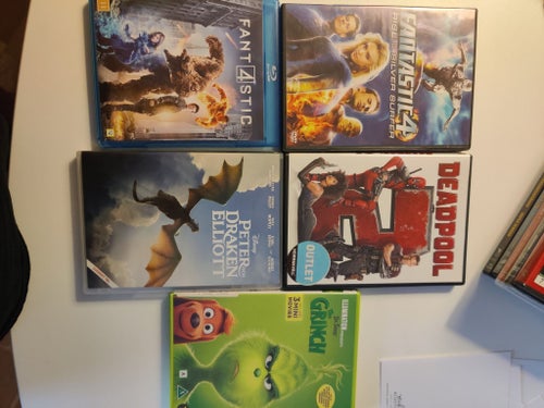 DVD-filmer: Grinchen, Zuper Zebra, Tintin, Robinson Crusoe, Lego
