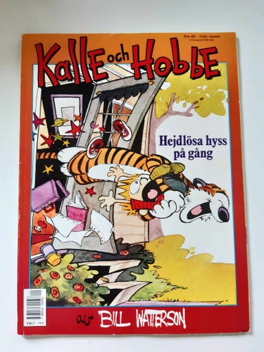Kalle och Hobbe av Bill Watterson med titeln "Hejdlösa hyss på gång" Seriealbum