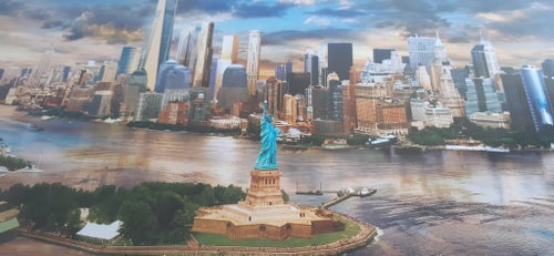 Foto av New York med Frihetsgudinnan (Statue of Liberty).