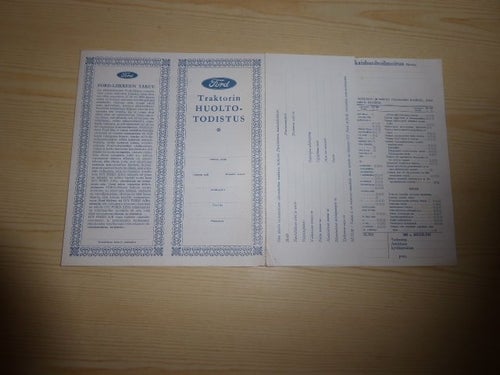 Oanvänd Ford traktor original service papper på finska sällsynt