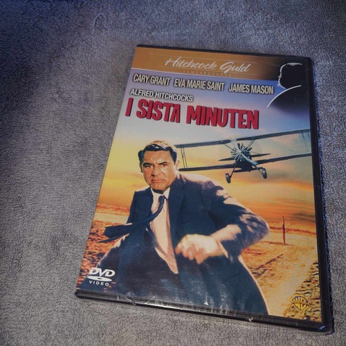 I sista minuten (inplastad), av Alfred Hitchcock med Cary Grant