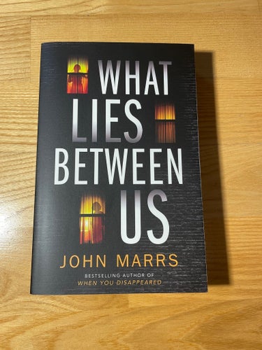 What Lies Between Us av John Marrs