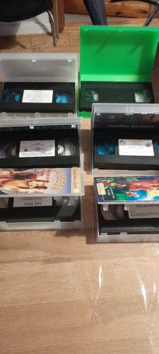 Blandet VHS-samling: The Simpsons, Junglebogen, Pocahontas, Scooby-Doo, Babe,