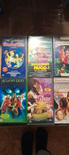 Blandet VHS-samling: The Simpsons, Junglebogen, Pocahontas, Scooby-Doo, Babe,