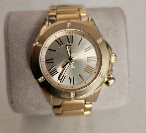 Juicy Couture Armbandsur i guldfärgad metall med strassdetaljer