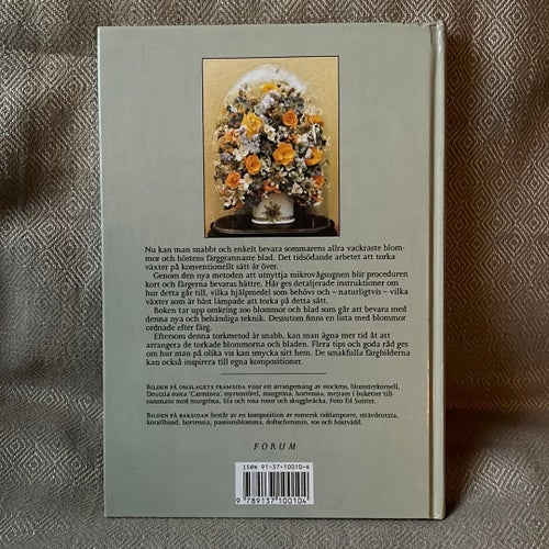 Torka blommor i mikrovågsugn av Titia Joosten, 1993