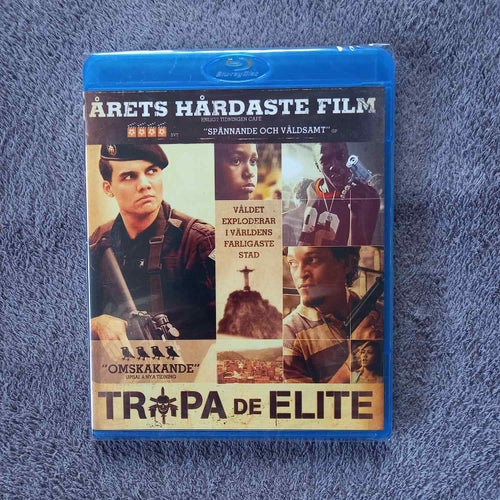 Trapa de elite | inplastad (ny!) | Svensk utgåva.