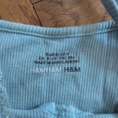 Ljusblå ribbad klänning med spets, stl. S, från H&M.