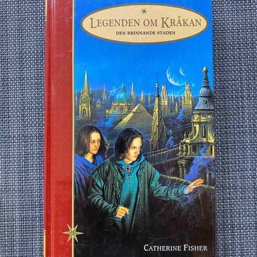 Catherine Fisher - Den brinnande staden - Legenden om kråkan