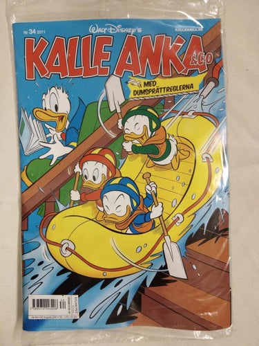 Kalle Anka & Co 2011 nr 34. inplastad. med leksak Batshooter