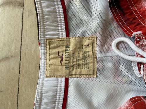 Hollister blommiga badshorts, storlek L