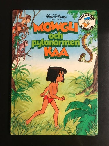 Walt Disney - Mowgli och pytonormen Kaa