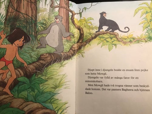 Walt Disney - Mowgli och pytonormen Kaa