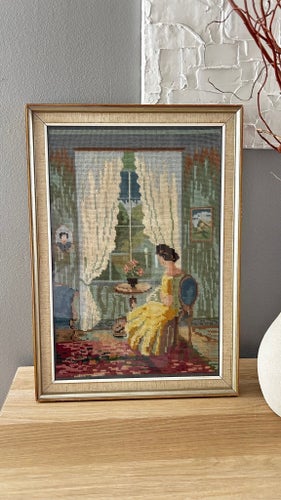 Tavla med broderat motiv