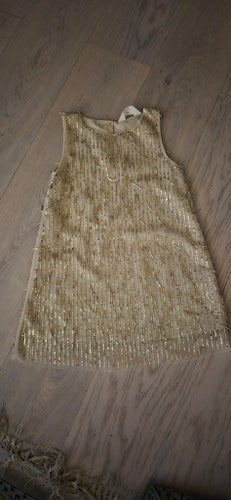 H&M guldklänning, storlek 110