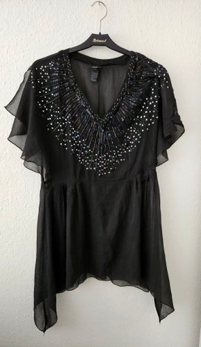 Svart fest tunika med paljetter H&M storlek 36
