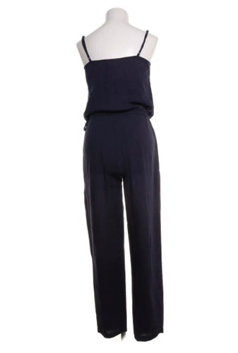 Mörkblå jumpsuit fr Raglady i 100% viscose stl S från Star Mela, fint skick