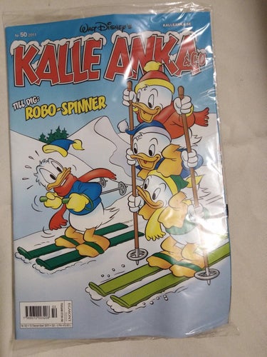 Kalle Anka & Co 2011 nr 50. inplastad. med leksak Robo-spinner Metallic edition