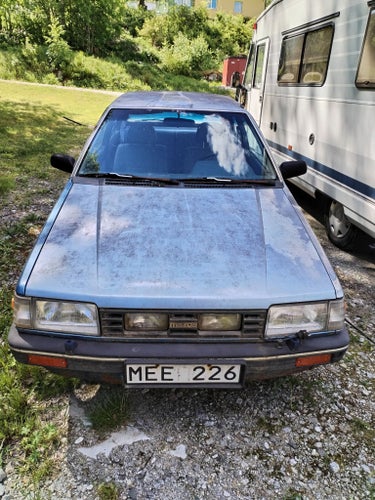 Mazda 323 3-dörrars Halvkombi, automat