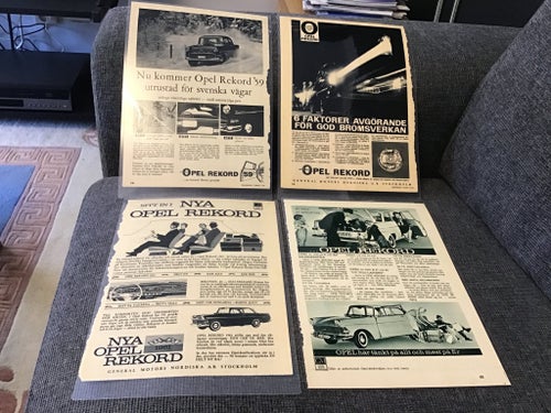 Fyra laminerade originalannonser för Opel Rekord.