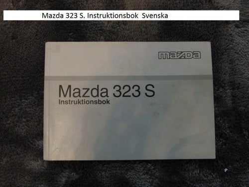 Mazda 323 S. Instruktionsbok Svenska