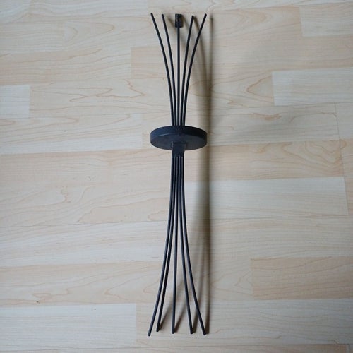 Väggljusstake i smide för värmeljus