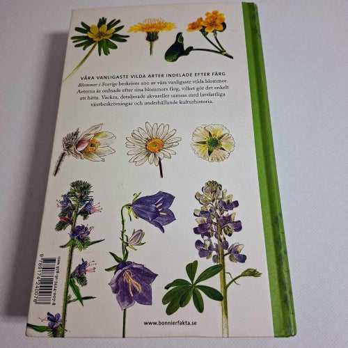 Blommor i Sverige : våra vanligaste vilda arter indelade efter färg