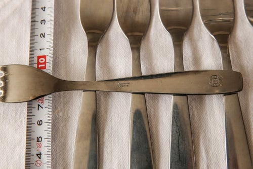 11 gafflar och 1 kniv i rostfritt Hackwerke Germany