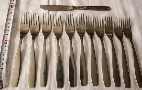 11 gafflar och 1 kniv i rostfritt Hackwerke Germany