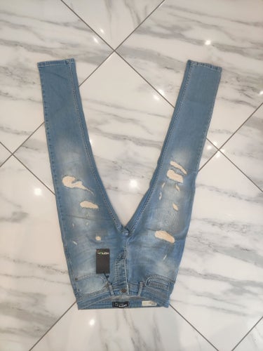 MERISH ljusblå jeans, storlek W: 31 L: 32