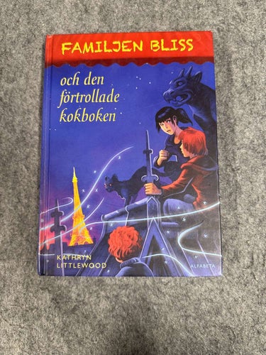 Kathryn Littlewood - Familjen Bliss och den förtrollade kokboken