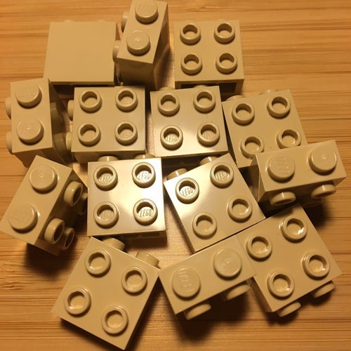 Lego 1x2 bit 4 st studs på sidan beige 14st