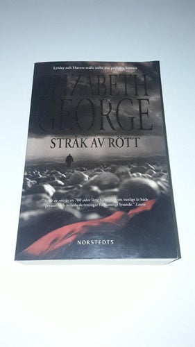 Elizabeth George - Stråk av rött (Häftad)