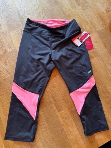 Röhnisch svart/rosa caprileggings, storlek M
