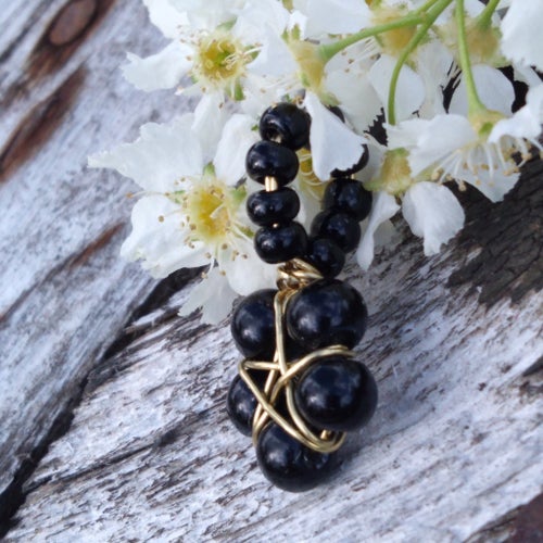 Handgjord lyckostjärna, halsband i mässing och glas. ca3cm, about 1 inch