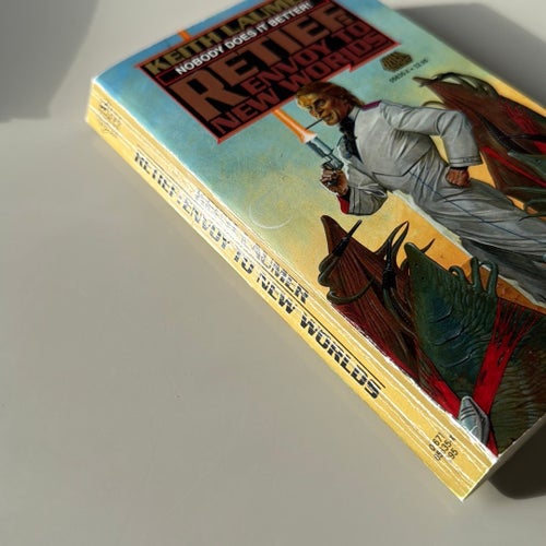 Retief: Envoy to New Worlds av Keith Laumer, 1987