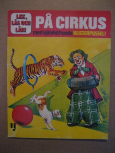 Barnbok -  På cirkus : med självhäftande klisterpussel!