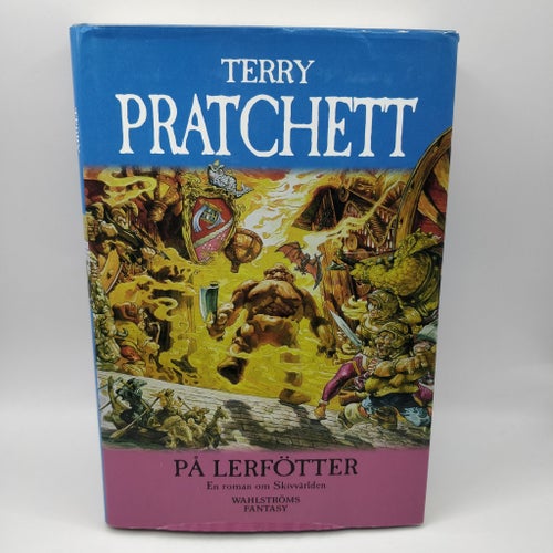 På lerfötter - Terry Pratchett - Discworld / Skivvärlden - Inbunden