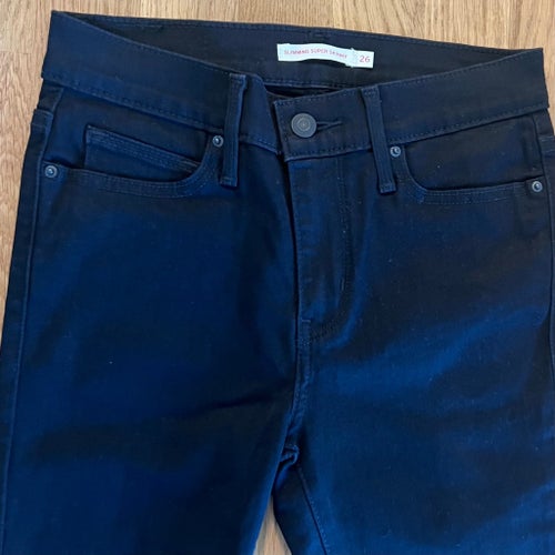 Nya Svarta Levis 710 super skinny i strl 26”/34”