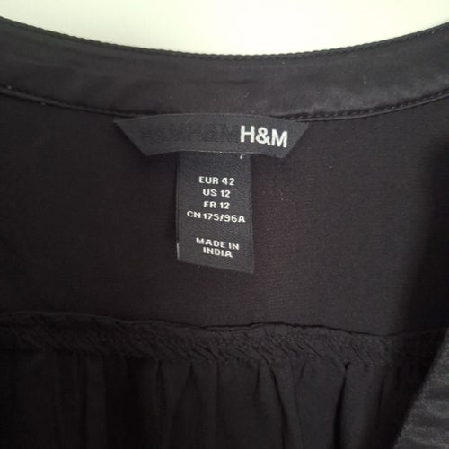 H&M svart topp, storlek 42