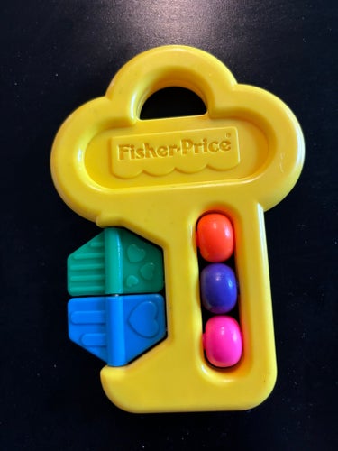 Baby Bebis retro leksak Fisher Price gul nyckel med rörliga detaljer