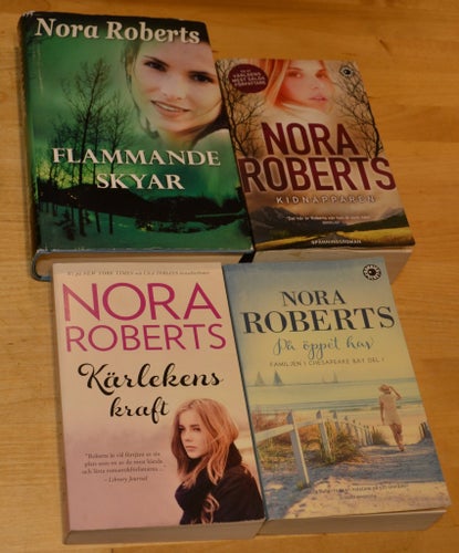 4 st Nora Roberts: Flammande skyar/ Kidnapparen/ På öppet hav/ Kärlekens kraft