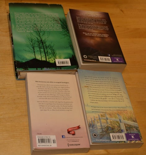 4 st Nora Roberts: Flammande skyar/ Kidnapparen/ På öppet hav/ Kärlekens kraft