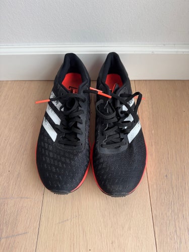 Adidas löparskor i svart, storlek 41 1/3