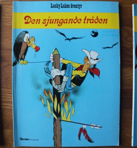 LUCKY LUKE NR 35 DEN SJUNGANDE TRÅDEN 1988 2:A UPPL