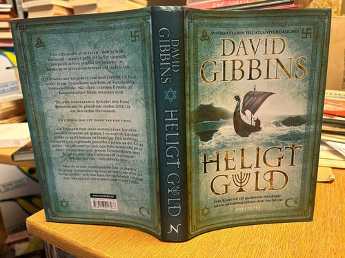 Heligt Guld av David Gibbins, bok, very fine plus